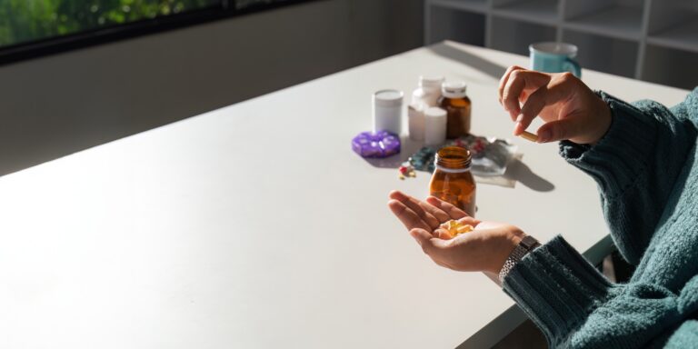 woman taking pill