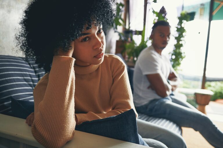 woman frustrated with man relationship anxiety partner